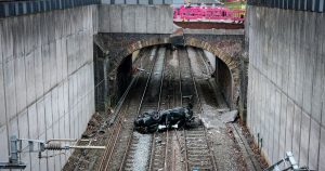 Read more about the article Live travel updates as car crashes at roundabout and lands on train track – Liverpool Echo