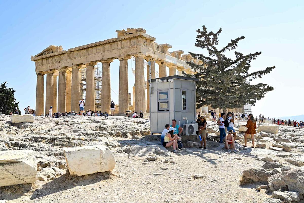 You are currently viewing Heat Waves and Wildfires Disrupt Travel Across the Mediterranean With Safety Alerts, Evacuations, and Landmark Closures—What Travelers Should Know – AOL.com