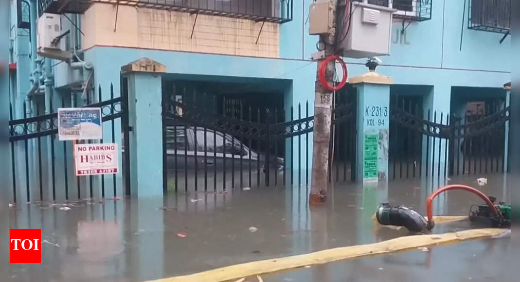 You are currently viewing Record rainfall in Kolkata: 7 electrocuted, schools closed power and metro services hit – Times of India