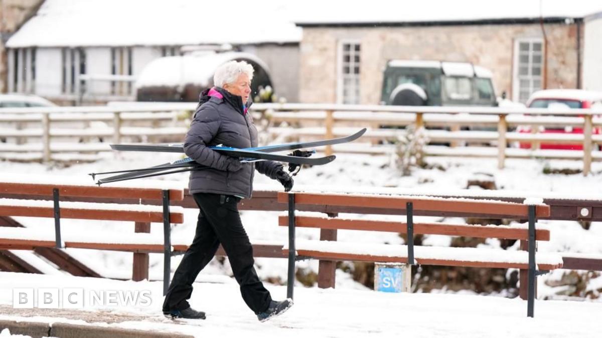 You are currently viewing Snow flurries, new weather warnings and schools closed as cold snap grips UK – BBC