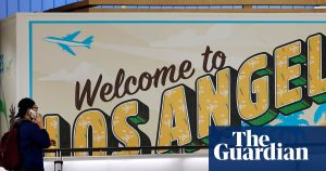 Read more about the article ‘The whole thing disgusts me’: Australians ditch US travel as new rules require social media to be declared – The Guardian