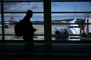 Read more about the article Shutdown fuels surging flight delays: TPG's tips for flying right now – The Points Guy
