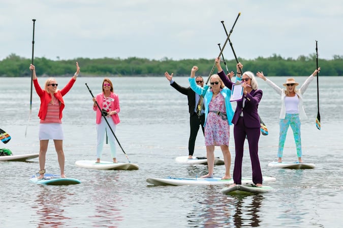 You are currently viewing Making a Splash: Florida Keys Leaders Trade Boardrooms for Paddleboards to Support the Local Tourism Economy (Video) – South Florida Reporter